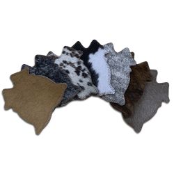 Cowhide Shaped Coasters. Sold individually
