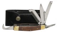 Showman 5 bladed knife. Comes with leather case