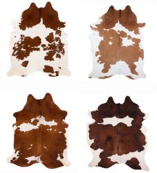 LG/XL Brazilian Brown and White hair on cowhide rug. Measures approx. 42.5 - 50 square feet
