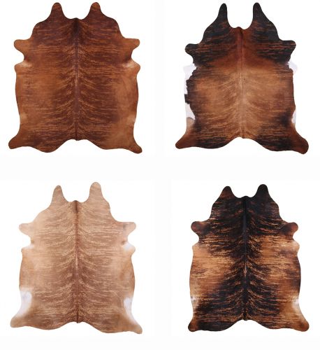 Large Brazilian Brindle hair on cowhide rug. Measures approx. 38-46 square feet