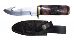 The Bone Collector Fixed blade knife with bone handle and dark oil leather holster