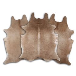 LG/XL Brazilian Caramel hair on cowhide rugs. Measures approximately 42.5-50 square feet
