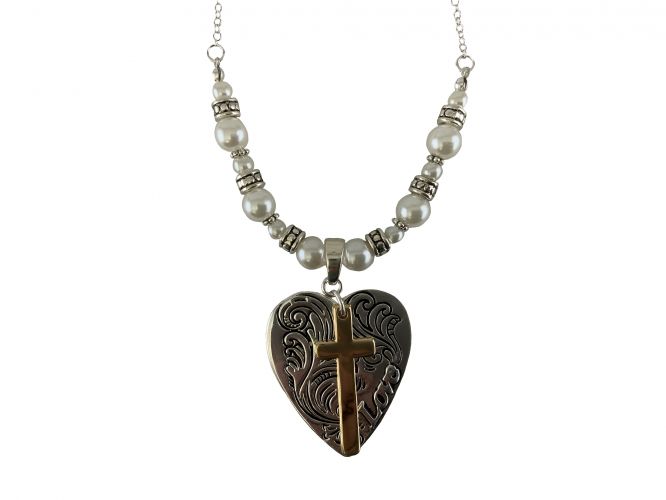 Silver beaded necklace set with gold cross on silver heart charm