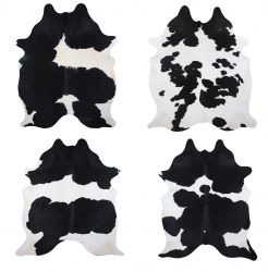LG/XL Brazilian Black and White hair on cowhide rug. Measures approx. 42.5 - 50 square feet