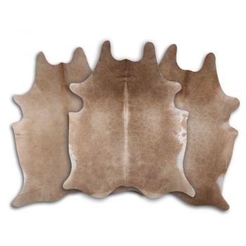 LG&#47;XL Brazilian Caramel hair on cowhide rugs. Measures approximately 42.5-50 square feet